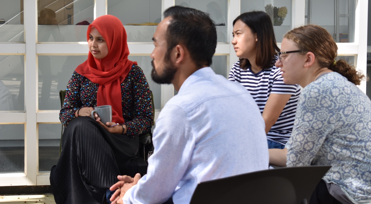 =Students listening to a lecture