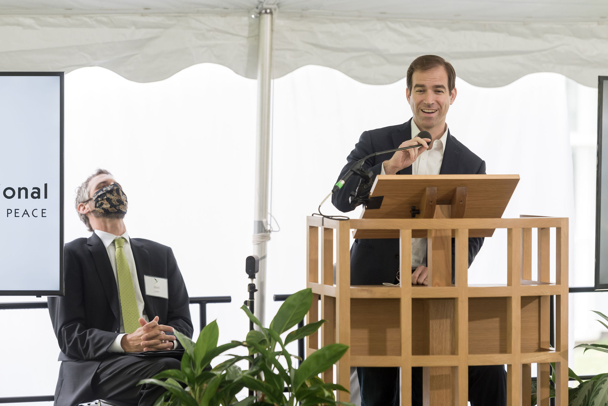 Mayor Luke Bronin speaking at podium