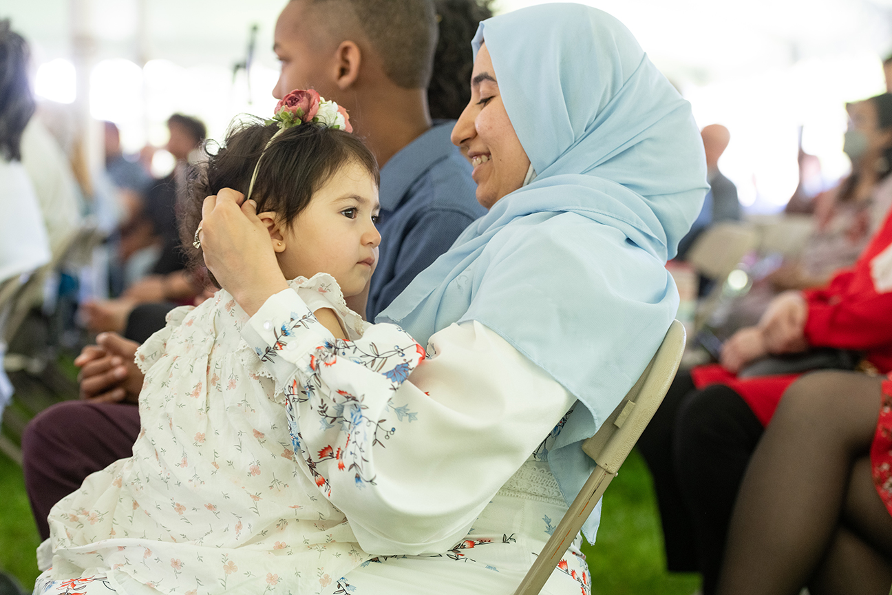 Woman in hijab with child
