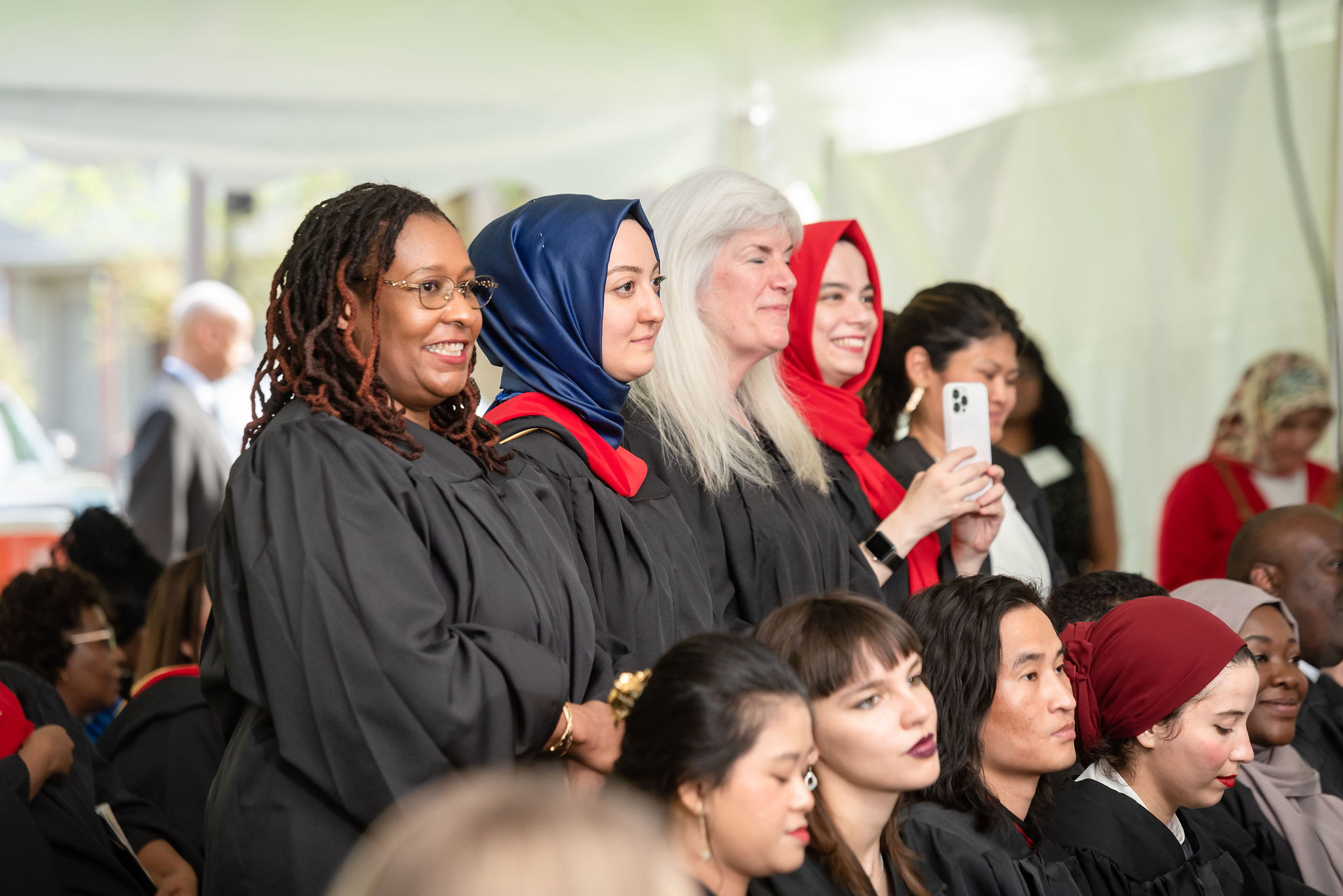 Line of graduates standing