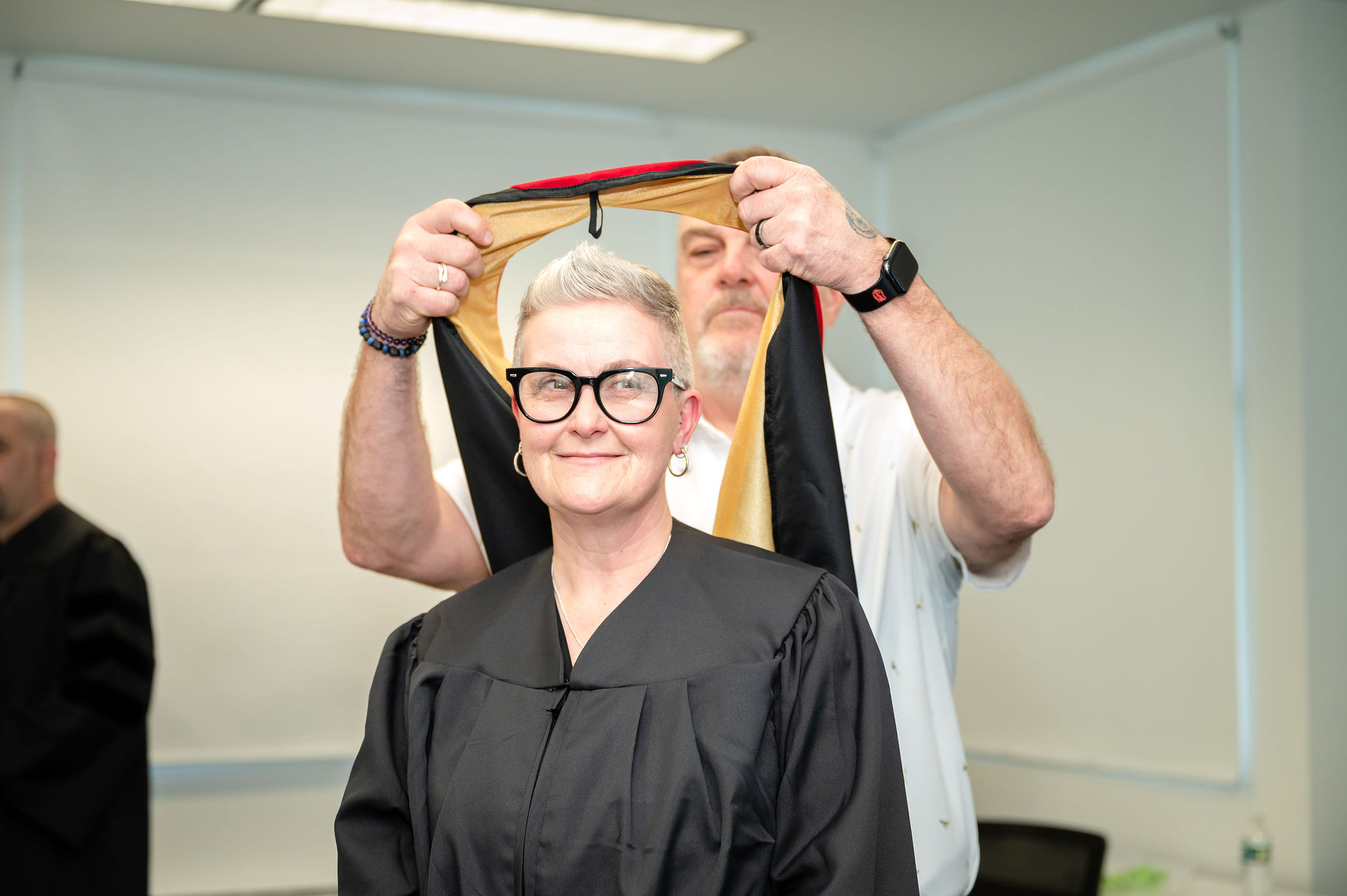Woman getting hooded