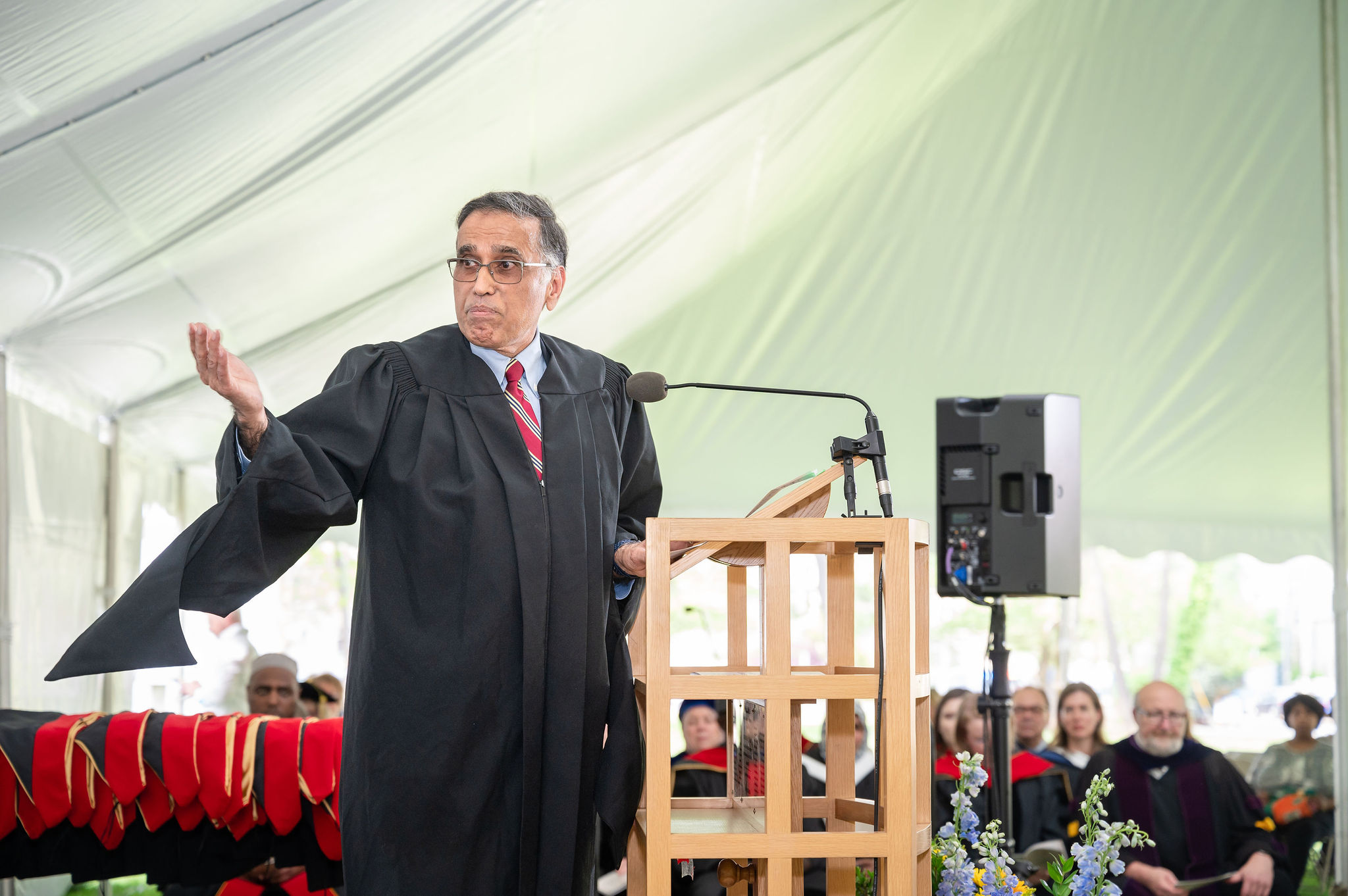 Man gesturing from podium