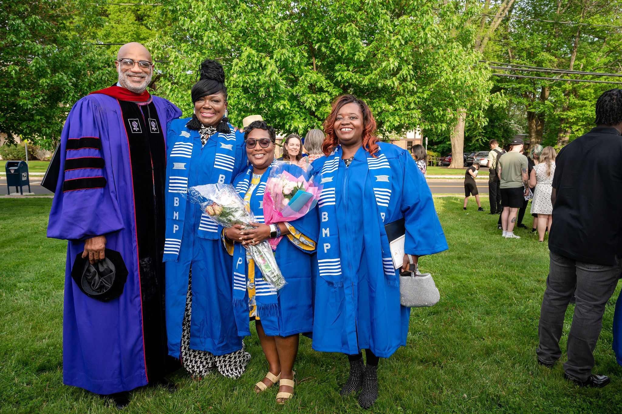 Group of graduates in blue robes