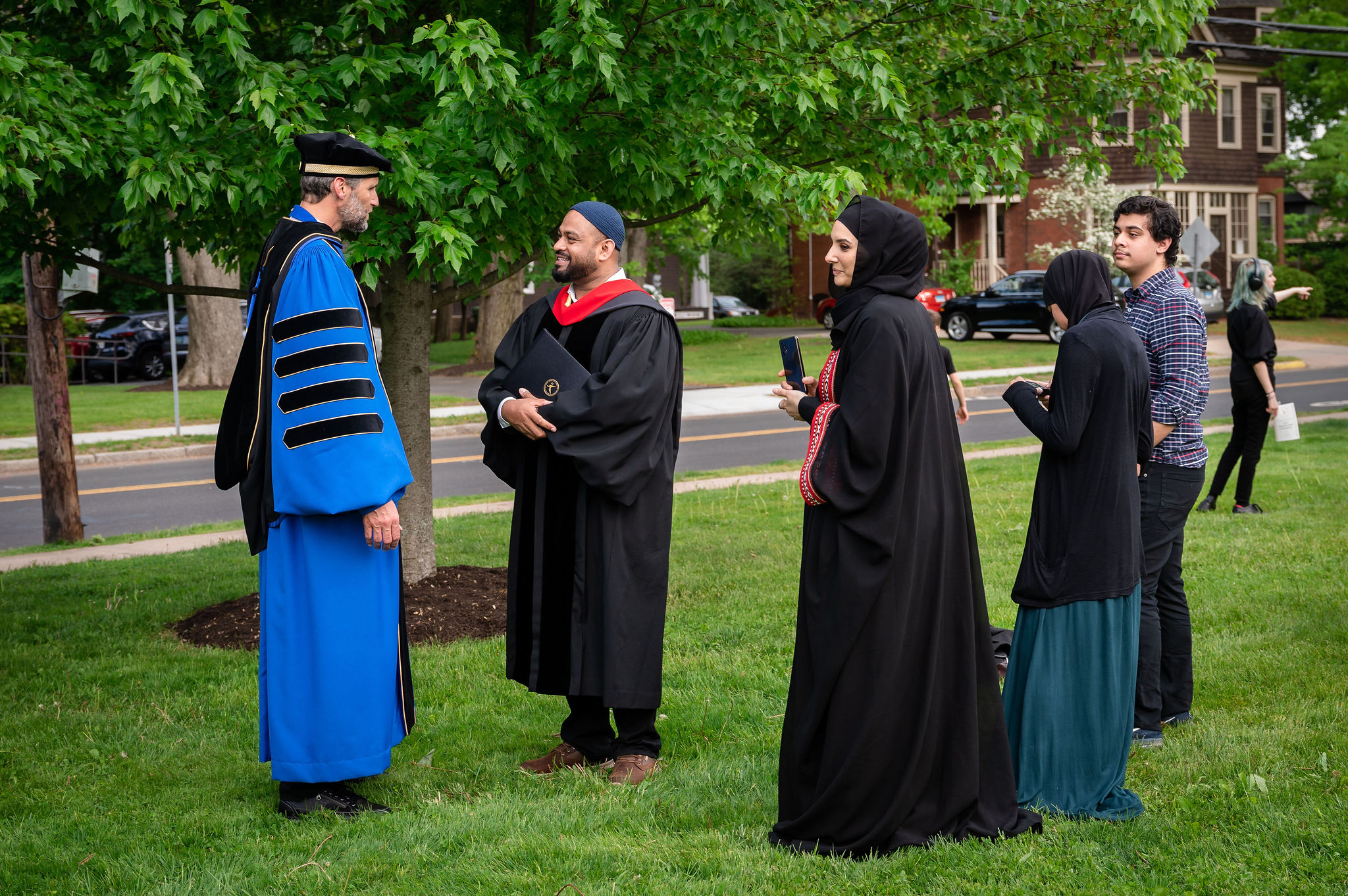 Graduates greeting president