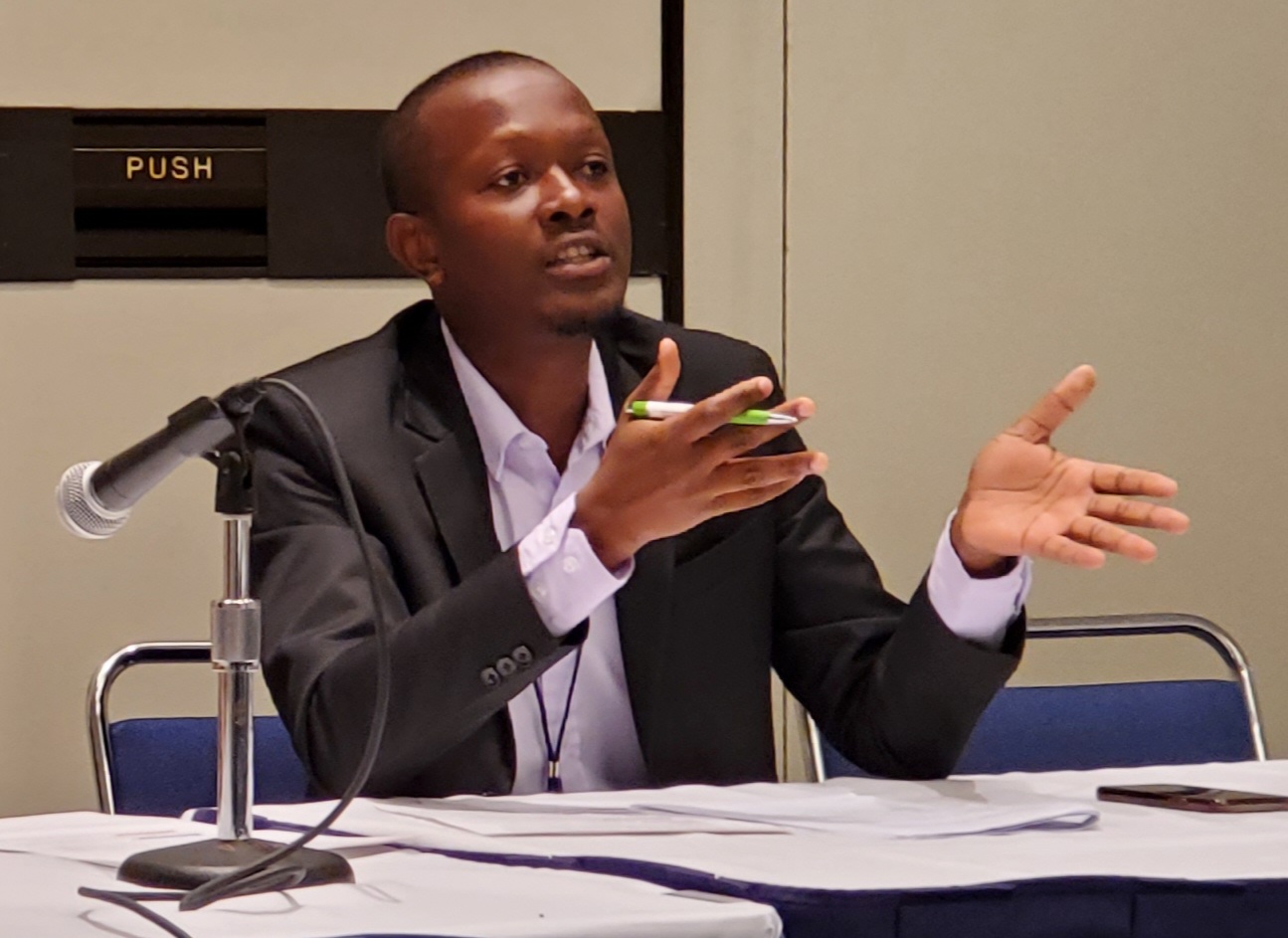 A young black man speaking