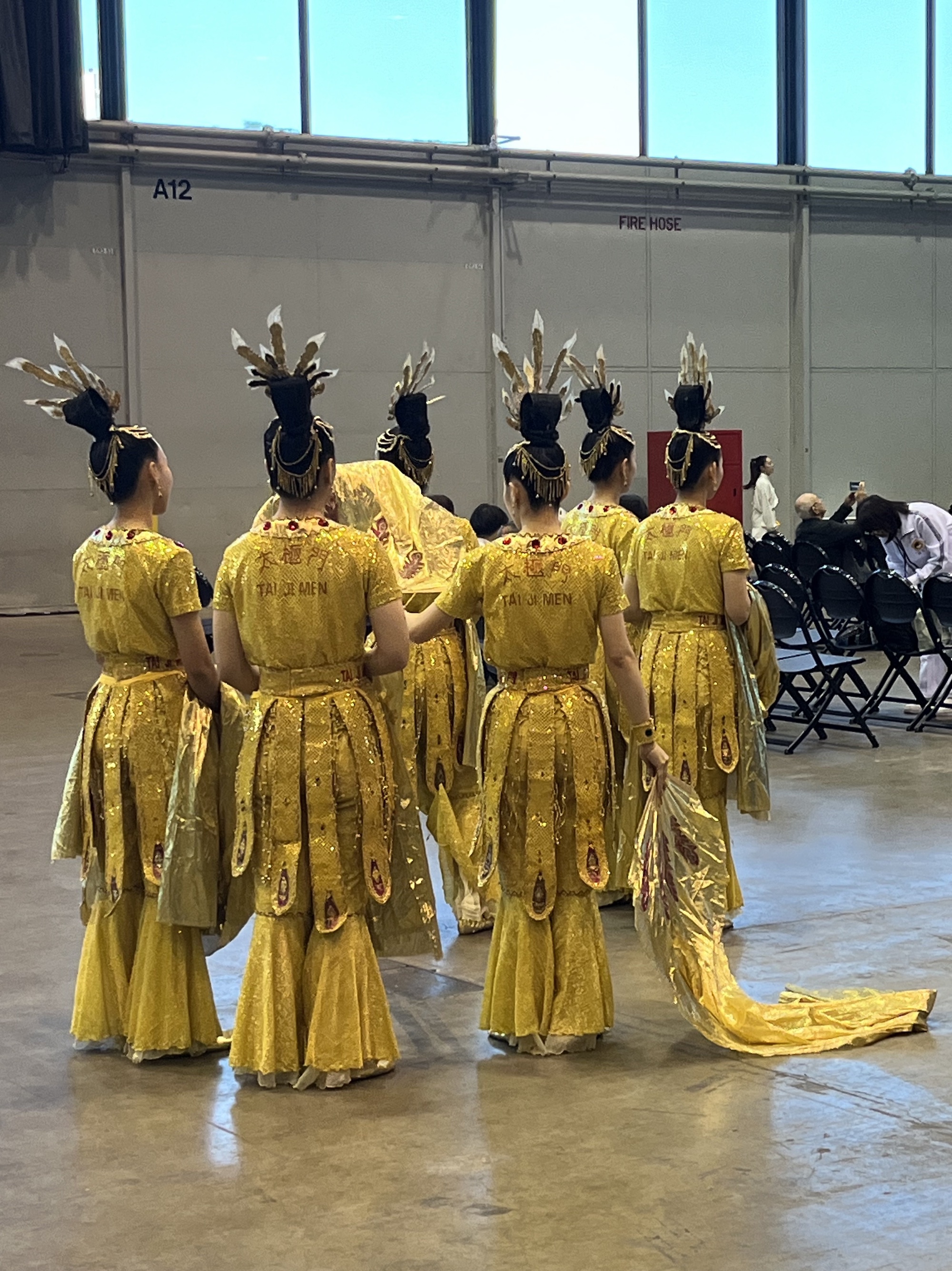 Dancers in gold costumes