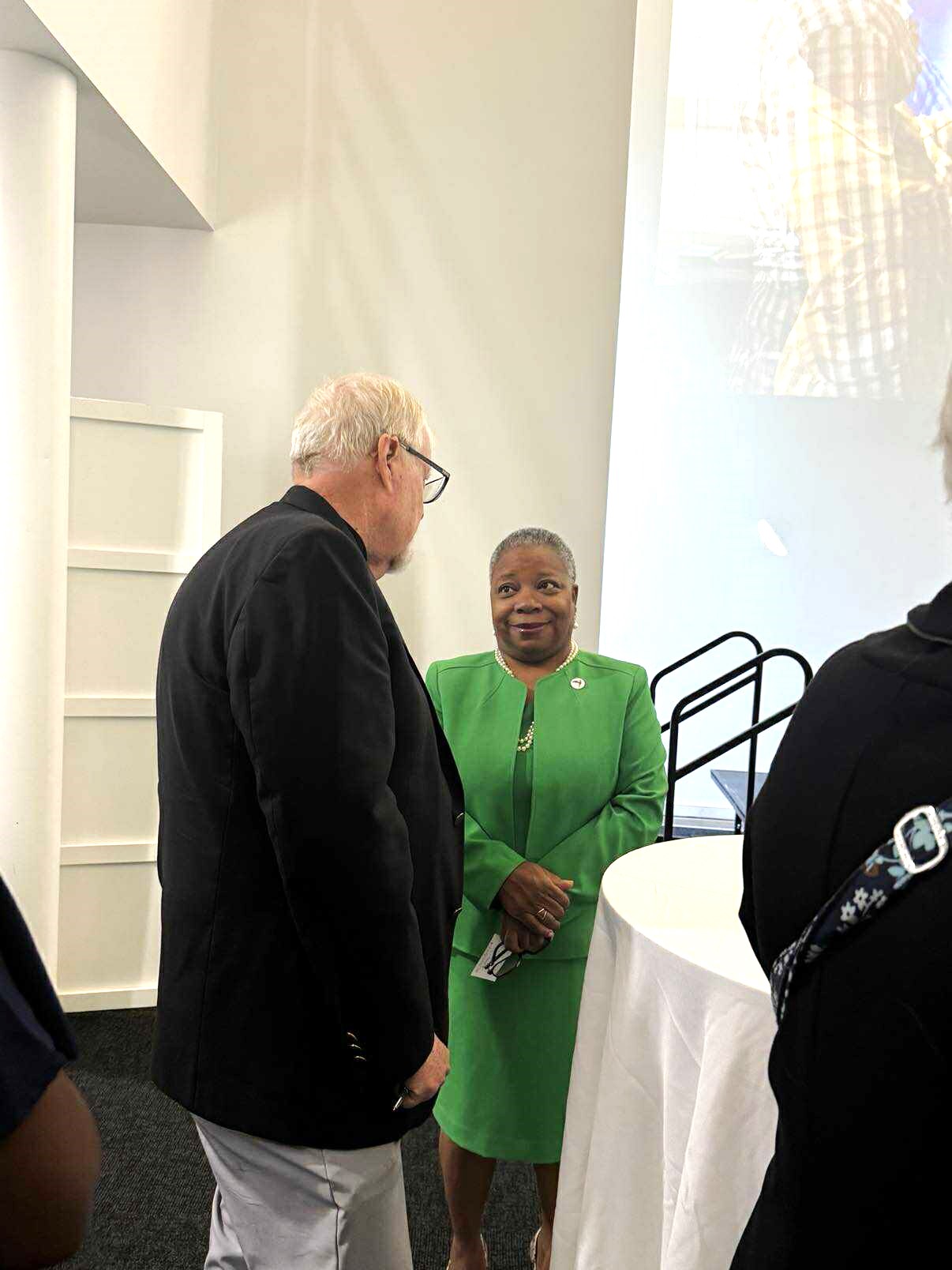 President Turner speaking to David Roozen