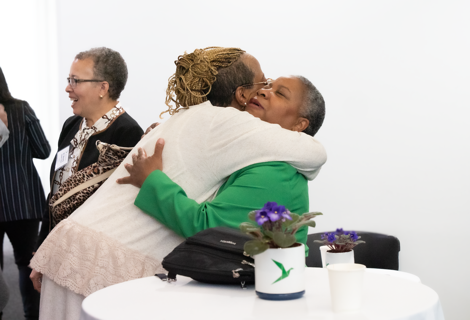 President Turner hugging friend